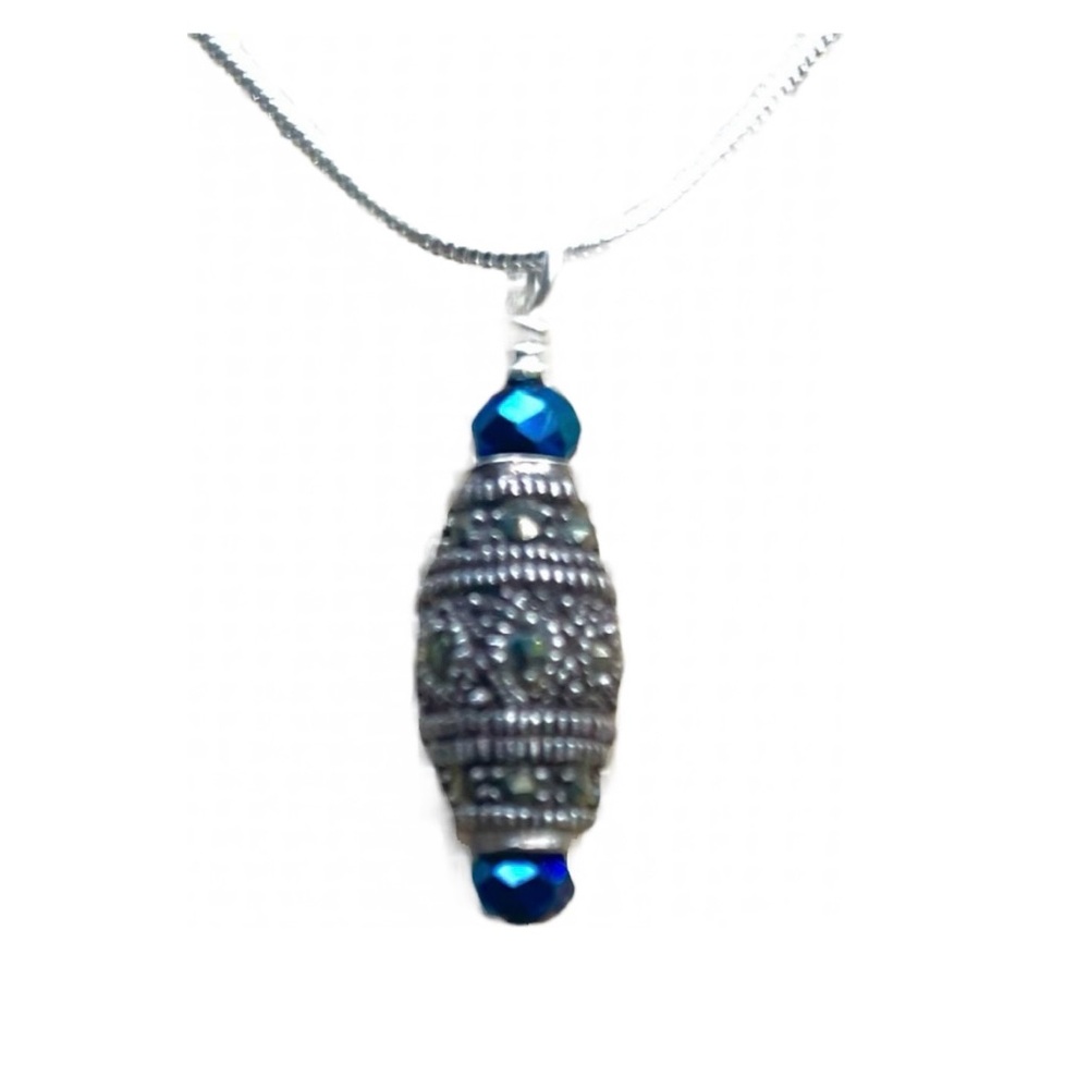 Marcasite pendant with Blue Swarovski Crystal. Wired by me. Vintage